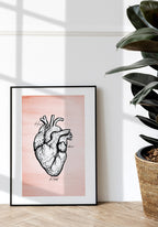 Poster with heart illustration on pastel red background in picture frame