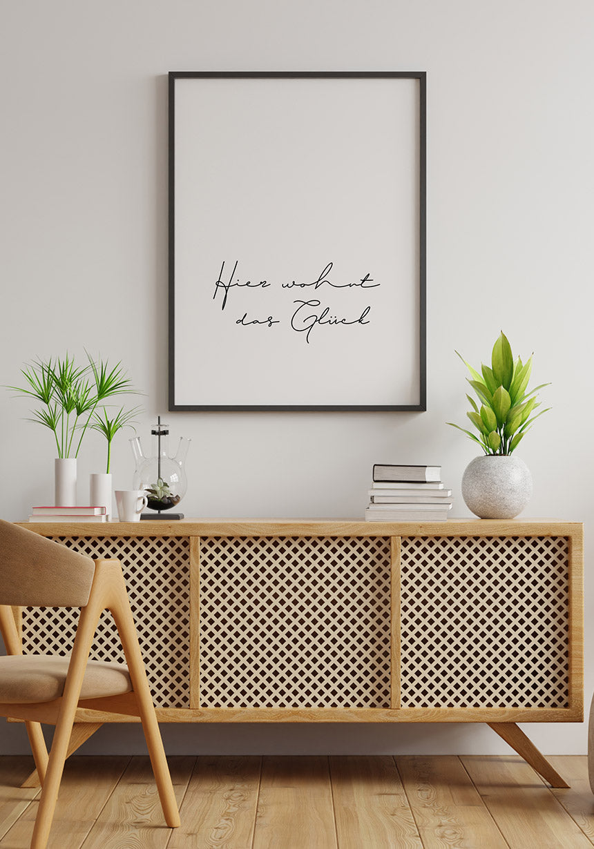 Poster here lives the happiness in the living room