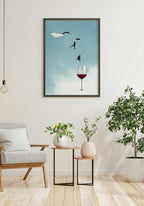 Poster leap from people into a wine glass in the living room on white wall