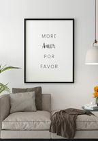 Poster more amor por favor over sofa