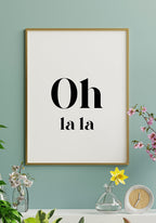 Oh la typography poster in golden frame