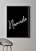 Namaste Yoga Poster white on black on wall