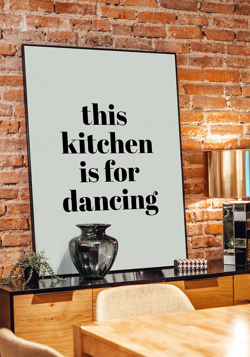 poster this kitchen is for dancing in front of brick wall